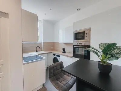 Cuisine ou kitchenette dans l'établissement Cozy Home Cannes