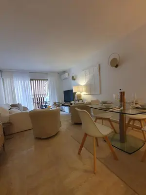 Coin salon dans l'établissement Appartement 2 pièces carré d or Les Floralies