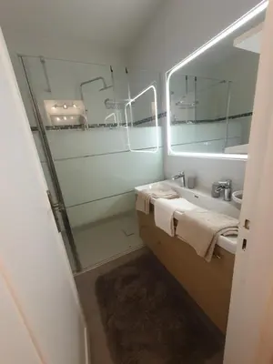 Salle de bains dans l'établissement Appartement 2 pièces carré d or Les Floralies