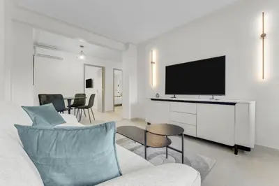 Télévision ou salle de divertissement dans l'établissement 2 chambres Martinez