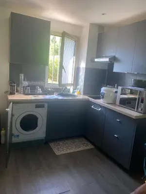 Cuisine ou kitchenette dans l'établissement APP RDC GRANDE TERRASSE 43 m2 air-conditioned apartment MAX 6 PEOPLE