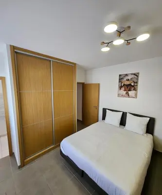 Un ou plusieurs lits dans un hébergement de l'établissement Juan-les-Pins 2-room apartment