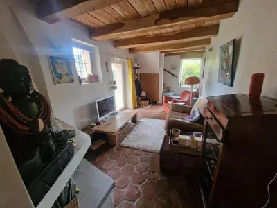 Télévision ou salle de divertissement dans l'établissement Un petit coin de tranquile près de la mer