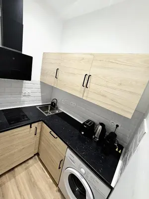 Cuisine ou kitchenette dans l'établissement Azura