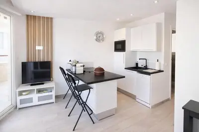 Cuisine ou kitchenette dans l'établissement Juan Signature