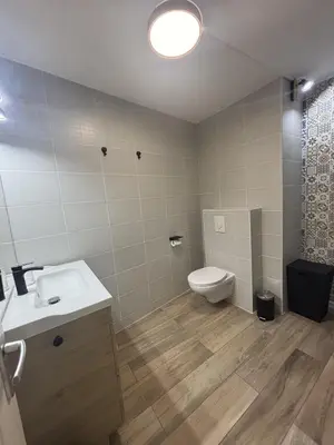 Salle de bains dans l'établissement Les Sables d'Or
