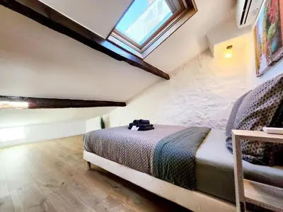 Un ou plusieurs lits dans un hébergement de l'établissement Le Cauvi - Climatisé proche de la plage