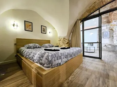 Un ou plusieurs lits dans un hébergement de l'établissement Le Bain Méditerranéen - Joli T2 dans le vieil Antibes