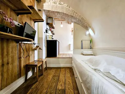 Un ou plusieurs lits dans un hébergement de l'établissement La Studette Bain - Studio au coeur du vieil Antibes