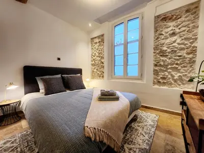 Un ou plusieurs lits dans un hébergement de l'établissement Le Massena Central - Dans le Vieil Antibes