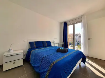 Un ou plusieurs lits dans un hébergement de l'établissement Le Marenda - Appartement au coeur d'Antibes