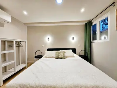 Un ou plusieurs lits dans un hébergement de l'établissement Le Magnum Riviera - Maison Proche de la Plage