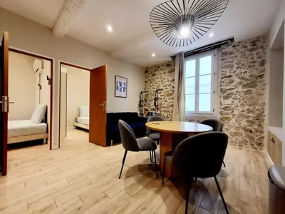 Un ou plusieurs lits dans un hébergement de l'établissement Le Sade 1er et Le Sade 2nd - 2 Appartements au coeur d'Antibes