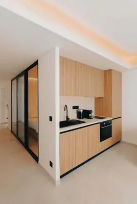 Cuisine ou kitchenette dans l'établissement 2 Appartements porte à porte Groupe & famille