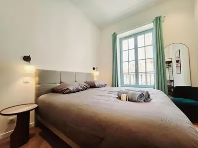 Un ou plusieurs lits dans un hébergement de l'établissement Le De Gaulle 2nd - Plein centre ville