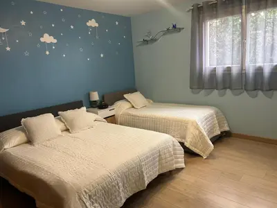 Un ou plusieurs lits dans un hébergement de l'établissement Family Villa SMB