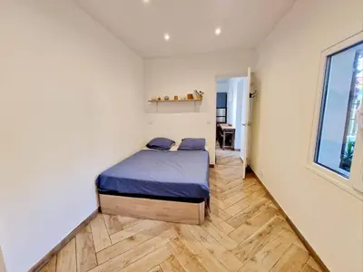 Un ou plusieurs lits dans un hébergement de l'établissement Appartement, terrasse plage, Mmm