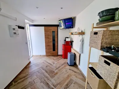 Cuisine ou kitchenette dans l'établissement Appartement, terrasse plage, Mmm