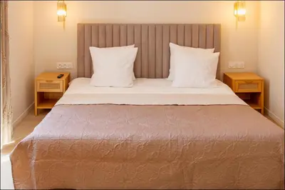 Un ou plusieurs lits dans un hébergement de l'établissement Hotel Villa Botanica