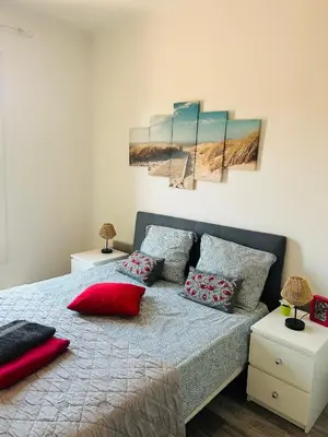 Un ou plusieurs lits dans un hébergement de l'établissement Casa Red Riviera