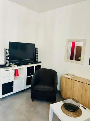 Télévision ou salle de divertissement dans l'établissement Casa Red Riviera