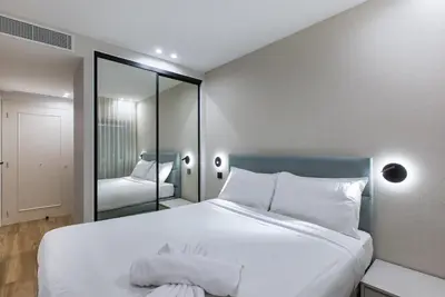 Un ou plusieurs lits dans un hébergement de l'établissement LUXURY EQUINOX 3 Bedrooms