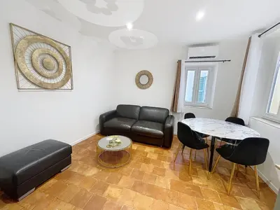 Coin salon dans l'établissement Duplex Cosy Viel Antibes