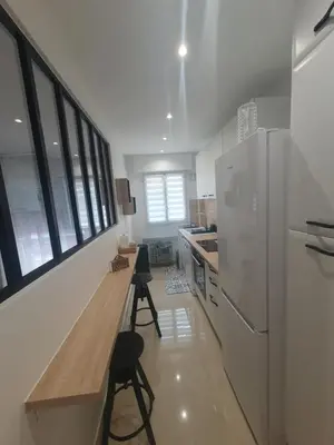 Cuisine ou kitchenette dans l'établissement Le Versailles appartement 4 prs cosy carre d or