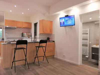 Cuisine ou kitchenette dans l'établissement Studio Détente avec Terrasse
