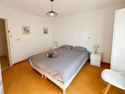 Un ou plusieurs lits dans un hébergement de l'établissement CAM103 - Beau 2 pièces avec terrasse