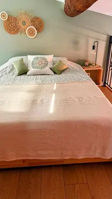 Un ou plusieurs lits dans un hébergement de l'établissement Boho Nest - Charming Boutique Apartment