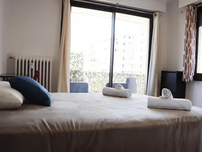 Un ou plusieurs lits dans un hébergement de l'établissement Apartment les Gemeaux by Interhome