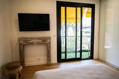 Un ou plusieurs lits dans un hébergement de l'établissement Bali à Cannes