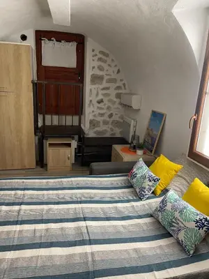 Un ou plusieurs lits dans un hébergement de l'établissement Antibes Centre Studio traditionnel vieille ville