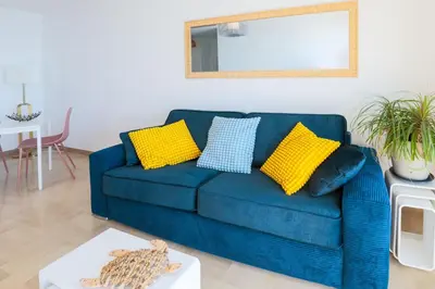 Coin salon dans l'établissement La Perle du Sud - Vue Mer Exceptionnelle