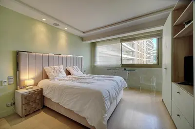 Un ou plusieurs lits dans un hébergement de l'établissement REF 1434 - Cannes Croisette - Sea view apartment for rent