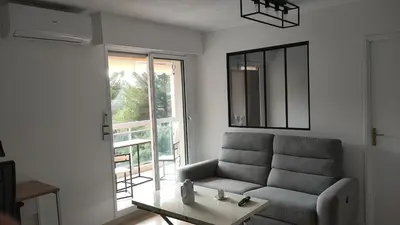 Coin salon dans l'établissement Apartment with residential pool