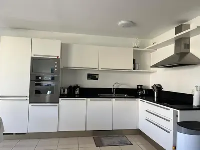 Cuisine ou kitchenette dans l'établissement Chemin des Iles