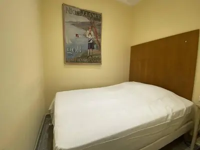 Un ou plusieurs lits dans un hébergement de l'établissement Cannes La Croisette - Studio face mer avec chambre cabine et balcon