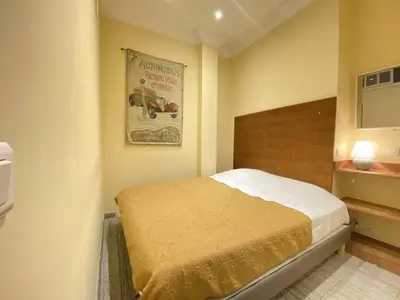 Un ou plusieurs lits dans un hébergement de l'établissement Cannes La Croisette - Studio face mer avec chambre cabine et balcon