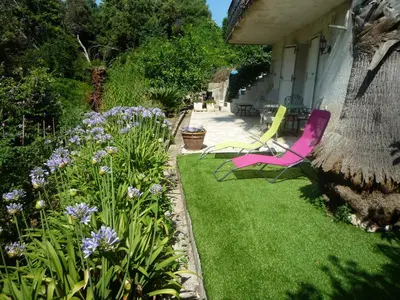 Jardin de l'établissement appartement Rez de Jardin,Bas de villa