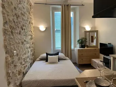 Un ou plusieurs lits dans un hébergement de l'établissement Studio dans le vieil Antibes