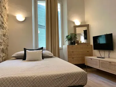 Un ou plusieurs lits dans un hébergement de l'établissement Studio dans le vieil Antibes