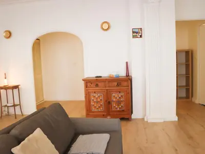 Coin salon dans l'établissement Apartment Le Lerins by Interhome