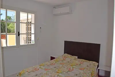 Un ou plusieurs lits dans un hébergement de l'établissement Villa Super Cannes avec vue mer