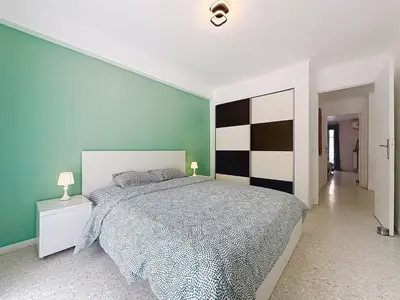 Un ou plusieurs lits dans un hébergement de l'établissement Cozy Apartment in Antibes