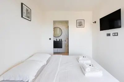 Un ou plusieurs lits dans un hébergement de l'établissement SWEETY- IDEAL COUPLE Moderne 2P, vue mer, parking, clim