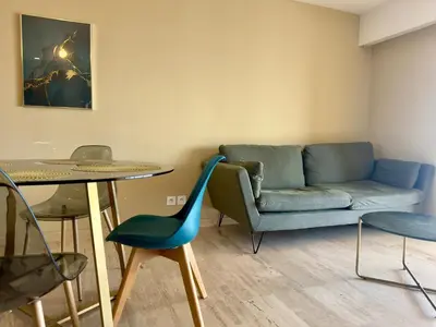 Coin salon dans l'établissement Sea view 4 people terrace 60 m & pool