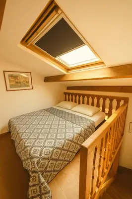 Un ou plusieurs lits dans un hébergement de l'établissement Le Cœur d Antibes Studio charme et confort