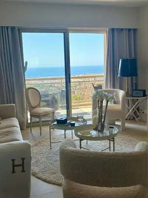 Coin salon dans l'établissement Stunning 3-Room with Panoramic Views Over Cannes